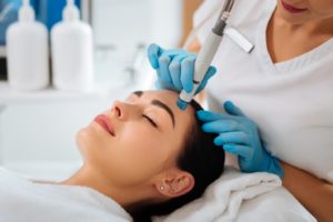 Female patient relaxing during HydraFacial in Chicago