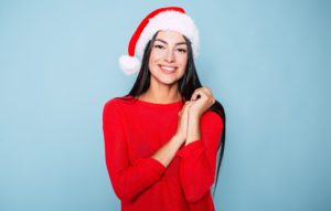 woman wearing Santa hat